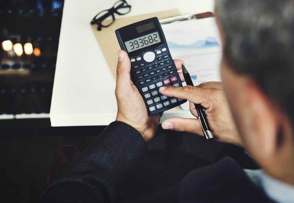 Businessman with a calculator